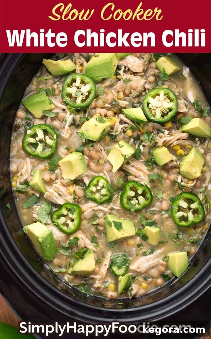 Slow Cooker White Chicken Chili with the recipe title and Simply happy Foodie.com logo