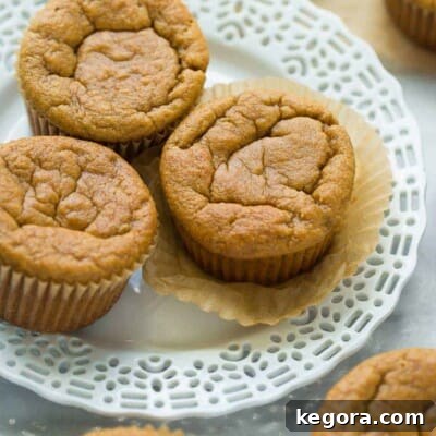 A beautifully presented coconut flour banana muffin recipe card image.