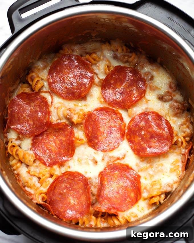 Instant Pot Cheesy Pizza Pasta Bake 5 Top view of Pizza Pasta Casserole in a pressure cooker