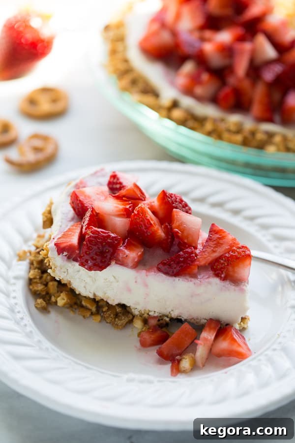 Vegan Strawberry Pretzel Crunch Ice Cream Pie Gluten-Free 2 Vegan Strawberry Ice Cream Pretzel Pie! Gluten-free pretzel crust with an easy, homemade dairy-free cashew ice cream and fresh strawberries!