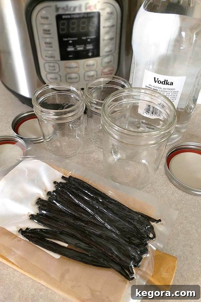 Supplies and ingredients needed to make vanilla extract, including vanilla beans, vodka, and jars.