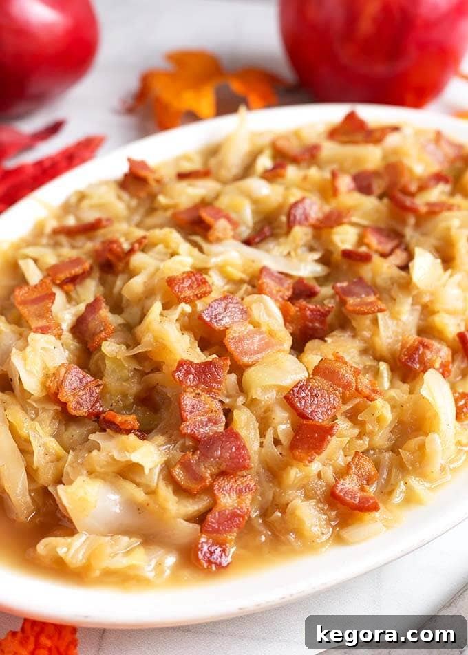 Braised Cabbage and Apples on a white oblong platter