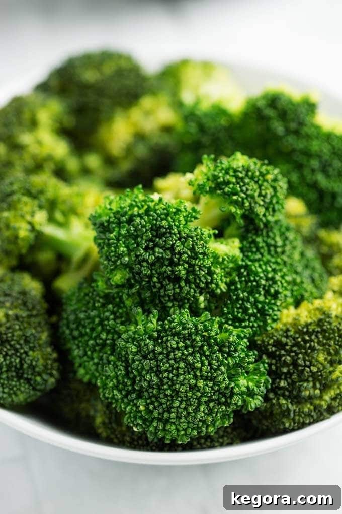 Perfect Instant Pot Broccoli 4 Closeup of cooked Broccoli in a white bowl