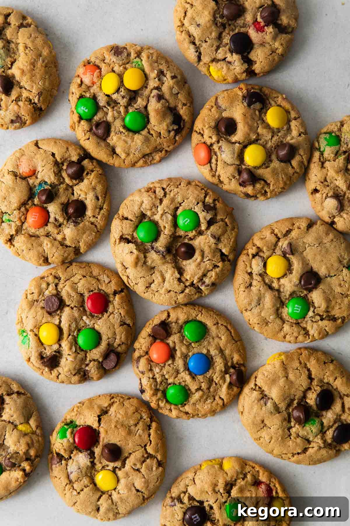 Epic Gluten-Free Monster Cookies 2 Gluten-free monster cookies spread on a countertop, showcasing their vibrant colors and chewy texture.