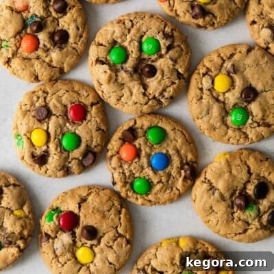 Epic Gluten-Free Monster Cookies 8 A overhead view of gluten-free monster cookies, showcasing their inviting texture and colorful mix-ins.