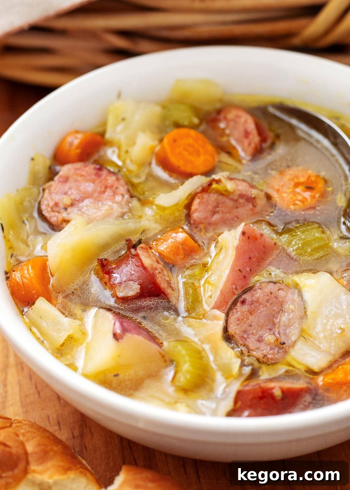 Instant Pot Kielbasa Cabbage Potato Soup in white bowl