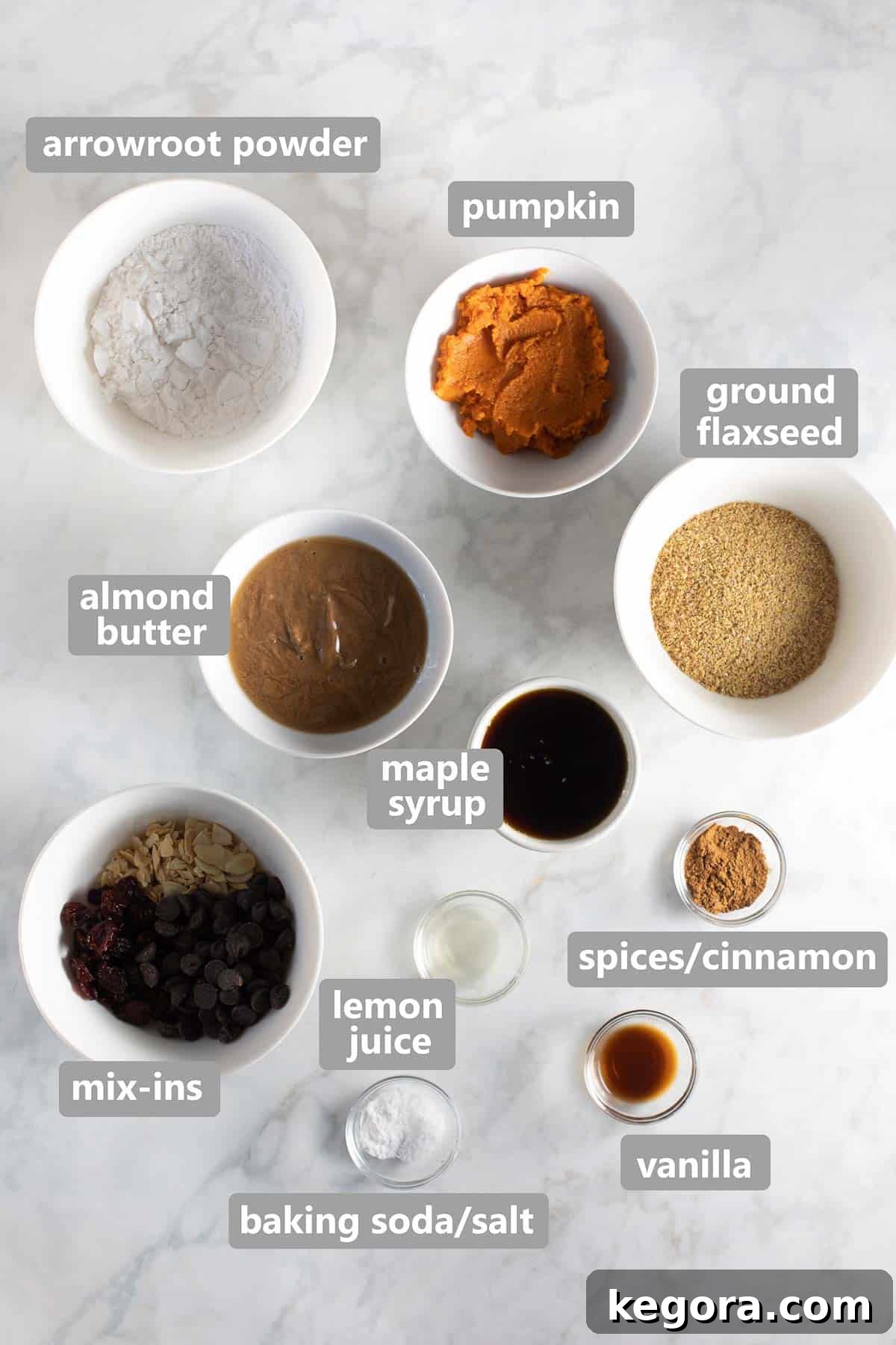 Cozy Vegan Pumpkin Breakfast Cookies 4 Overhead shot of all the carefully measured ingredients laid out in bowls, ready to be combined for baking vegan pumpkin cookies.