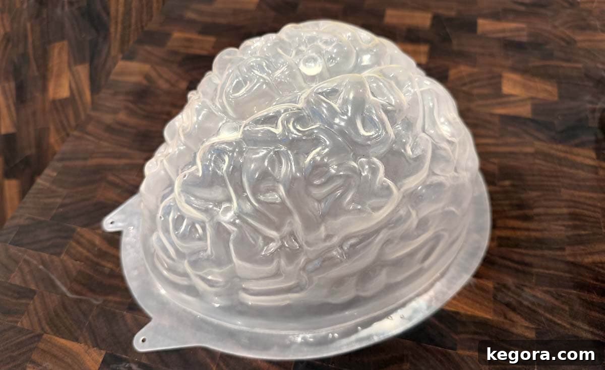 Ghoulish Jello Brain Recipe 3 A plastic brain mold, essential for making a realistic Halloween Jello Brain.