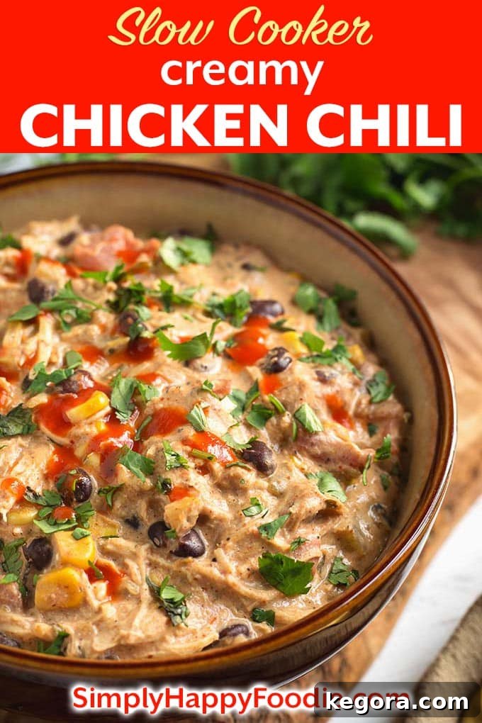 Slow Cooker Creamy Chicken Chili with the recipe title and Simply Happy Foodie.com logo
