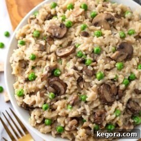 Dreamy Instant Pot Mushroom Pea Risotto 4 Instant Pot Mushroom Risotto with Peas is creamy, delicious, and super easy to make. This risotto is good with or without the peas. If you don't like them, just leave them out. Pressure cooker mushroom risotto with peas is one of my favorite Instant Pot recipes! simplyhappyfoodie.com #instantpotrisotto #pressurecookerrisotto
