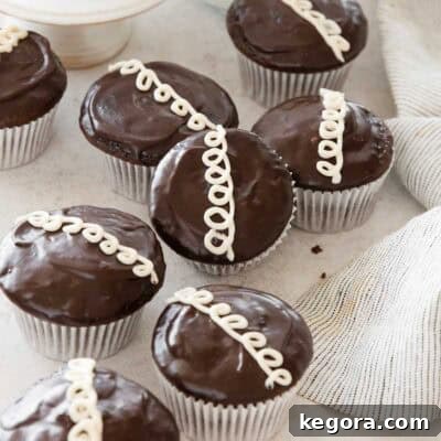 Gluten-free Hostess cupcakes, beautifully arranged on a countertop, ready to be enjoyed.