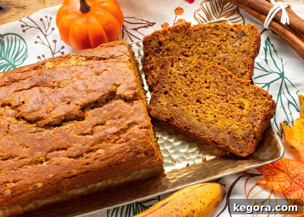 Moist Spiced Pumpkin Banana Bread Recipe 8 loaf of pumpkin banana bread partially sliced