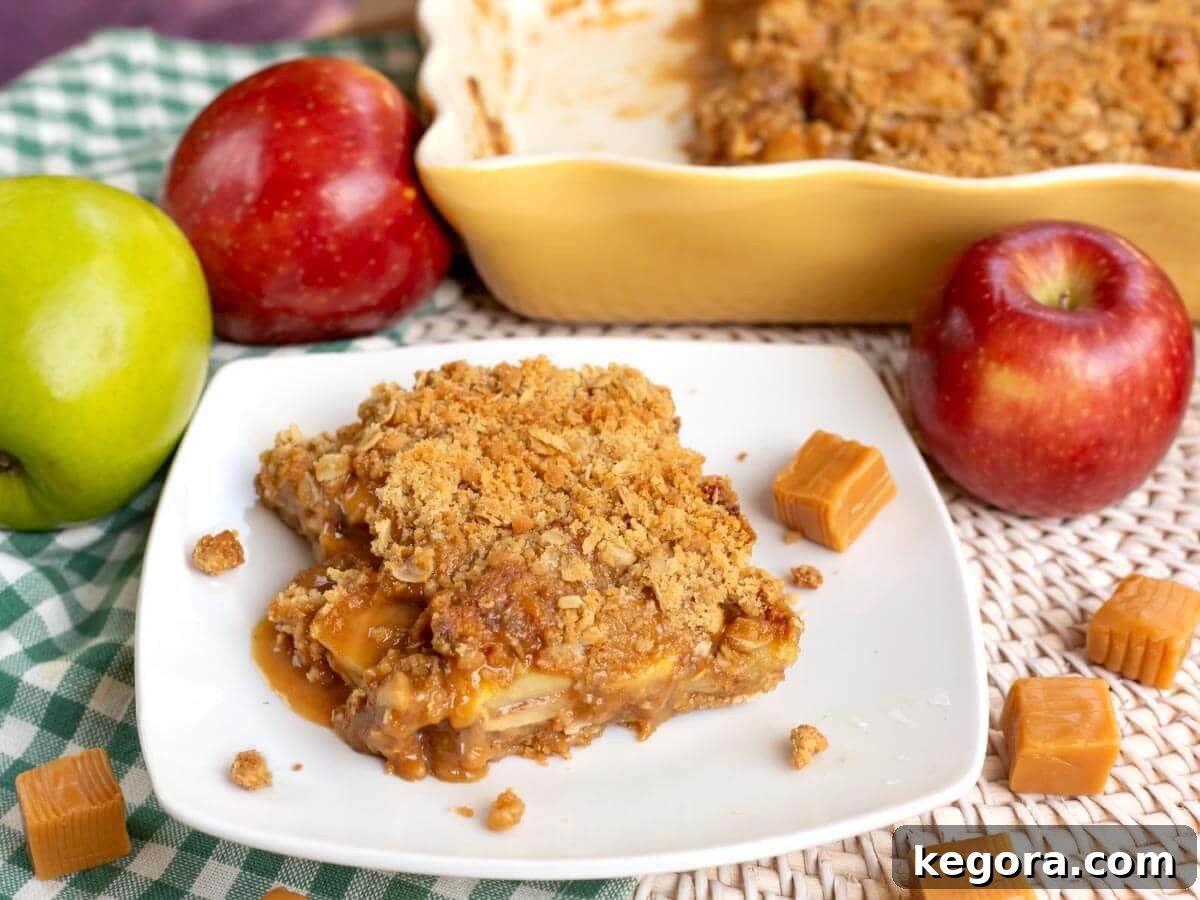 Salted Caramel Apple Crumble Bars 2 Caramel Apple Crumble Bars with tender apples, caramel, and oat crumble topping